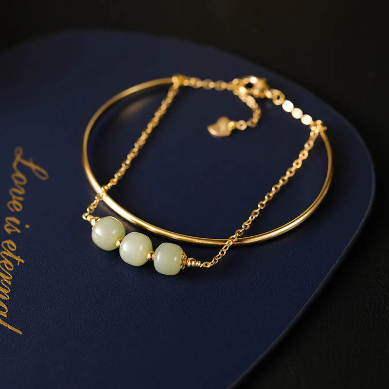 Women's jade lucky beads bracelet with gold inlay treatment showing single, double, and three beads versions
