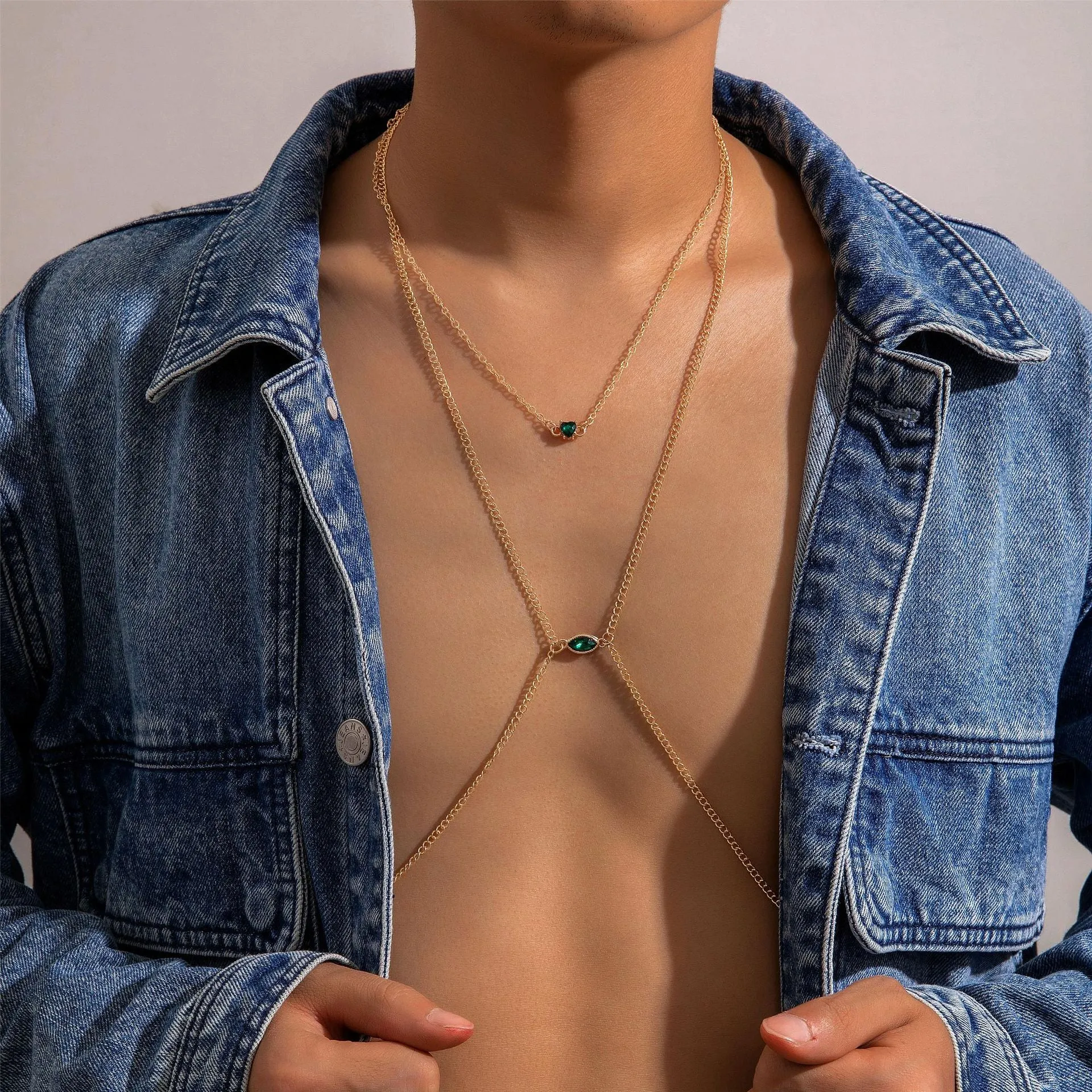 Men's simple gold-toned alloy body chain necklace with electroplated 25729 gold finish on a plain background.