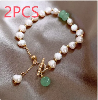 Women's irregular freshwater pearl adjustable bracelet on a plain background showing the alloy clasp and irregular pearl beads