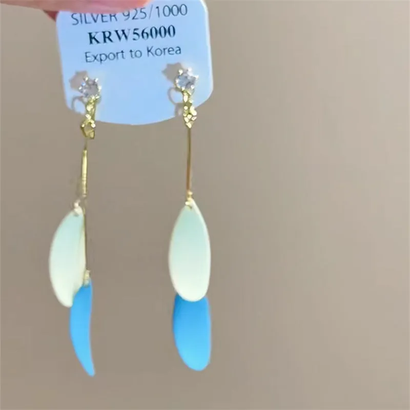 Exaggerated geometric ellipse electroplated mixed material earrings in seaside vacation style, unisex