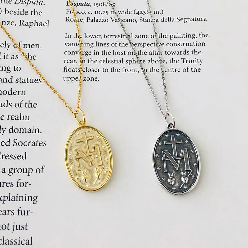 S925 sterling silver vintage embossed portrait coin-style pendant in gold finish on white background