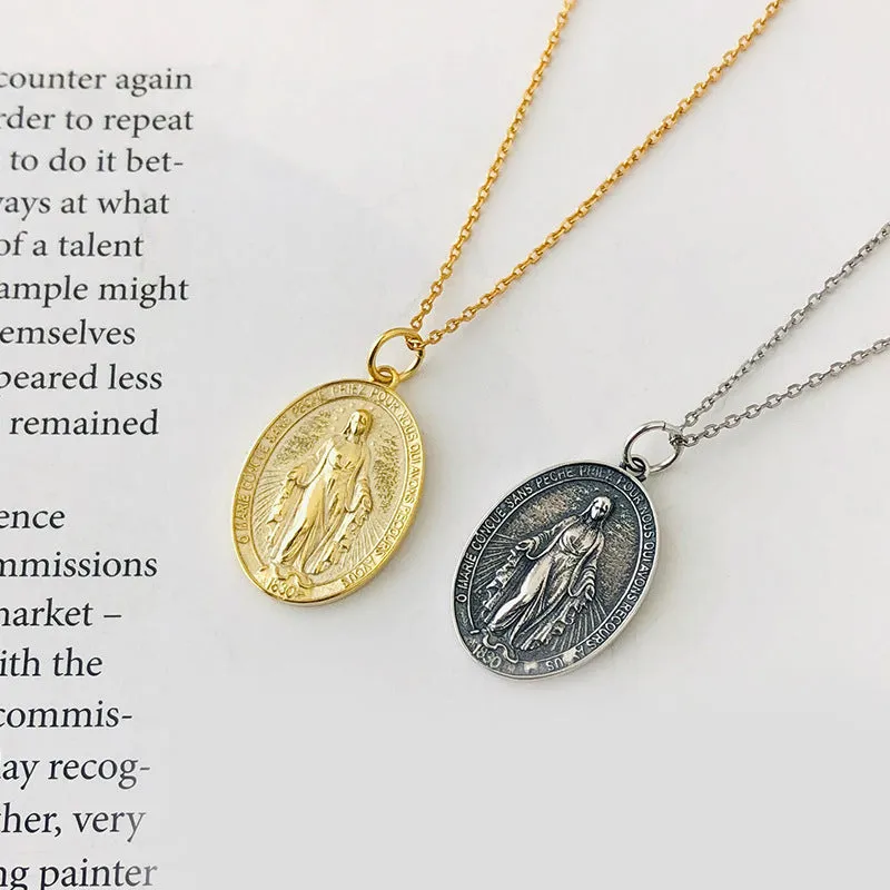 S925 sterling silver vintage embossed portrait coin-style pendant in gold finish on white background
