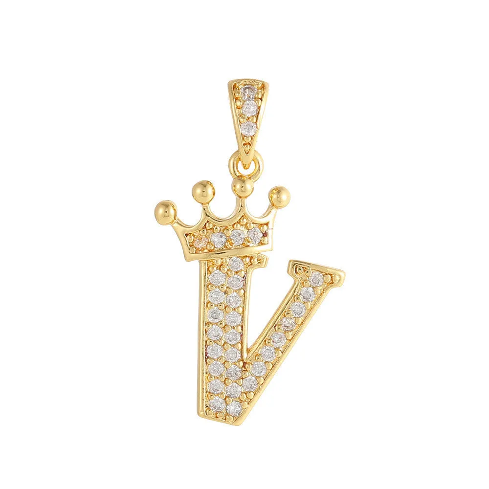 Gold plated copper letter A pendant with inlaid zircon crown and diamond cut surface on white background
