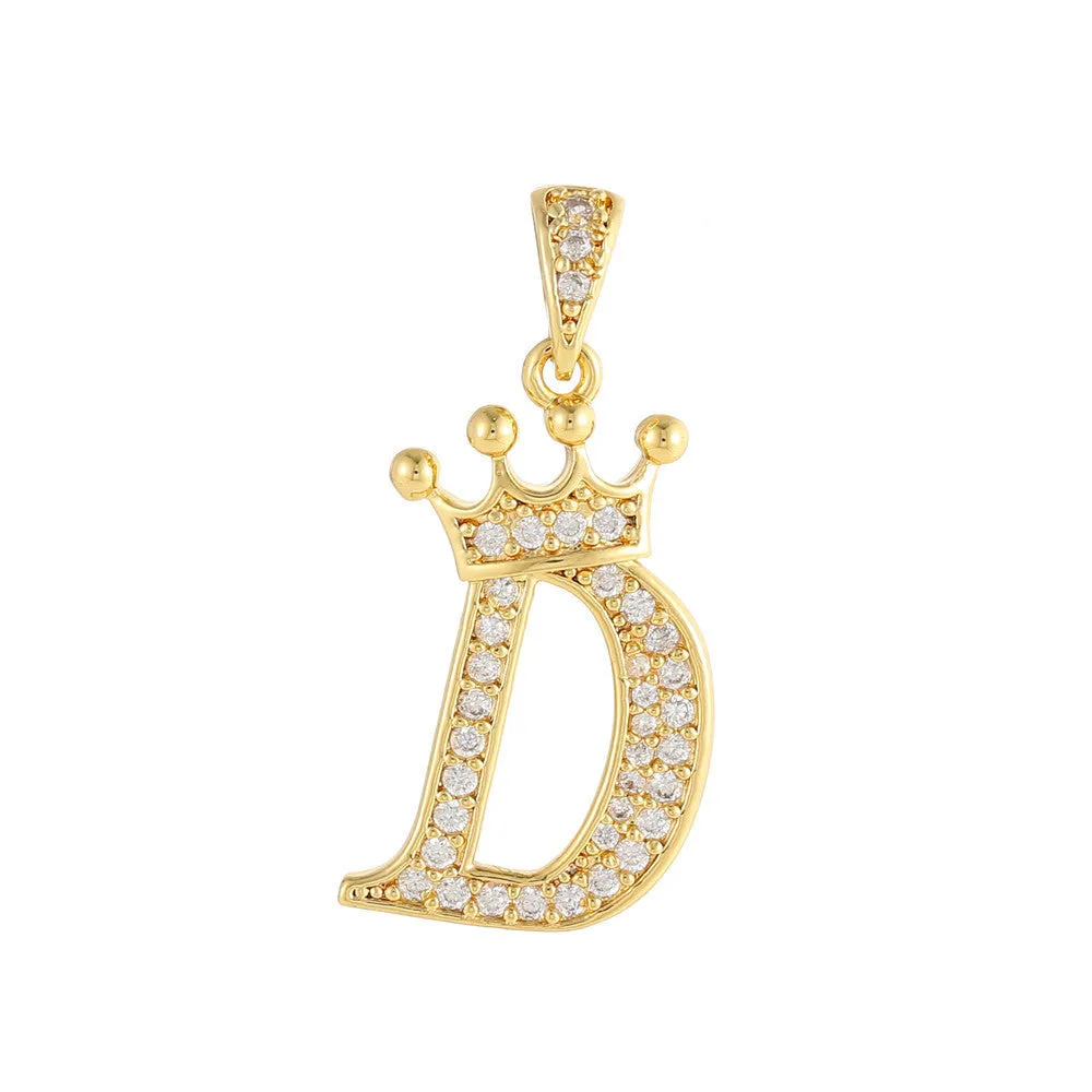 Gold plated copper letter A pendant with inlaid zircon crown and diamond cut surface on white background