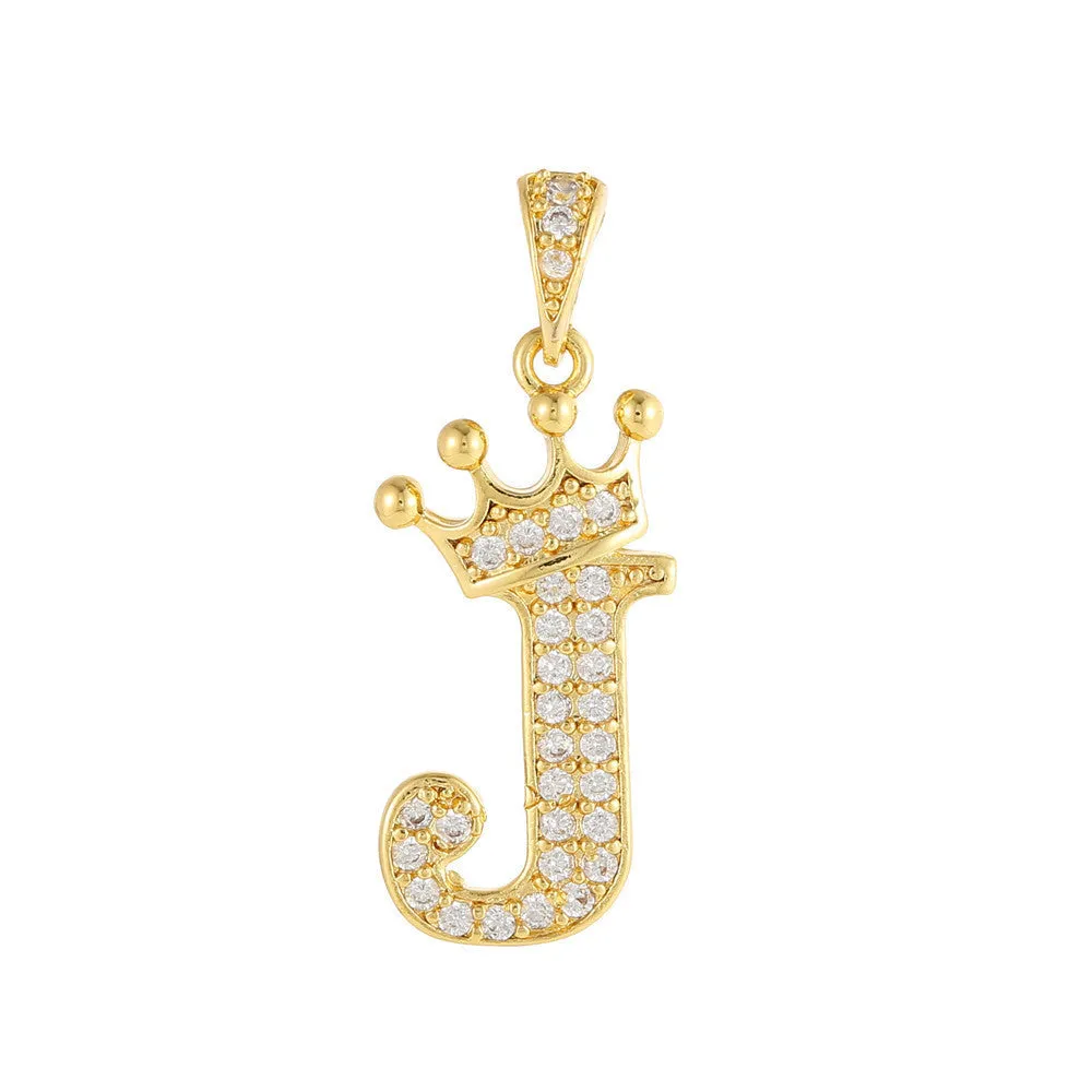 Gold plated copper letter A pendant with inlaid zircon crown and diamond cut surface on white background