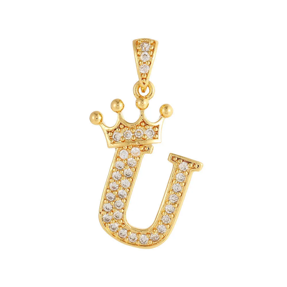 Gold plated copper letter A pendant with inlaid zircon crown and diamond cut surface on white background