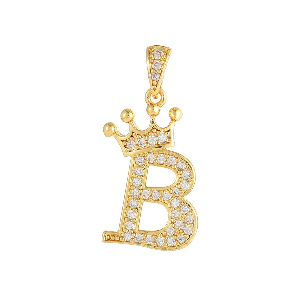 Gold plated copper letter A pendant with inlaid zircon crown and diamond cut surface on white background