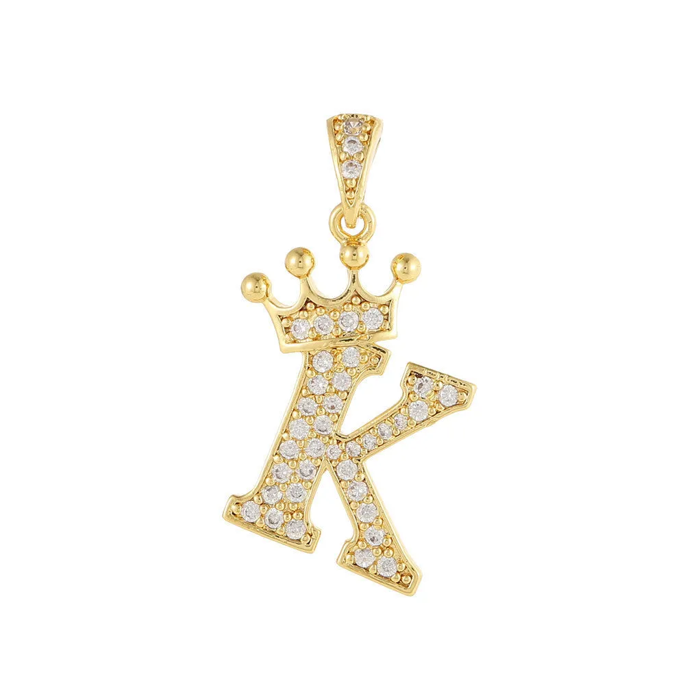 Gold plated copper letter A pendant with inlaid zircon crown and diamond cut surface on white background