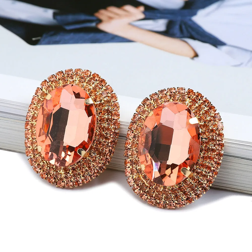 Women's oval rhinestone ear studs in eight colours including red, green, purple, black, white, pink, champagne, and AB finish