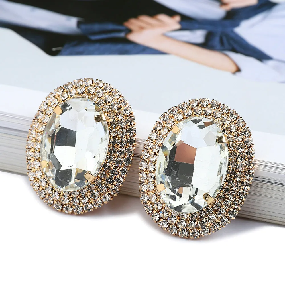 Women's oval rhinestone ear studs in eight colours including red, green, purple, black, white, pink, champagne, and AB finish