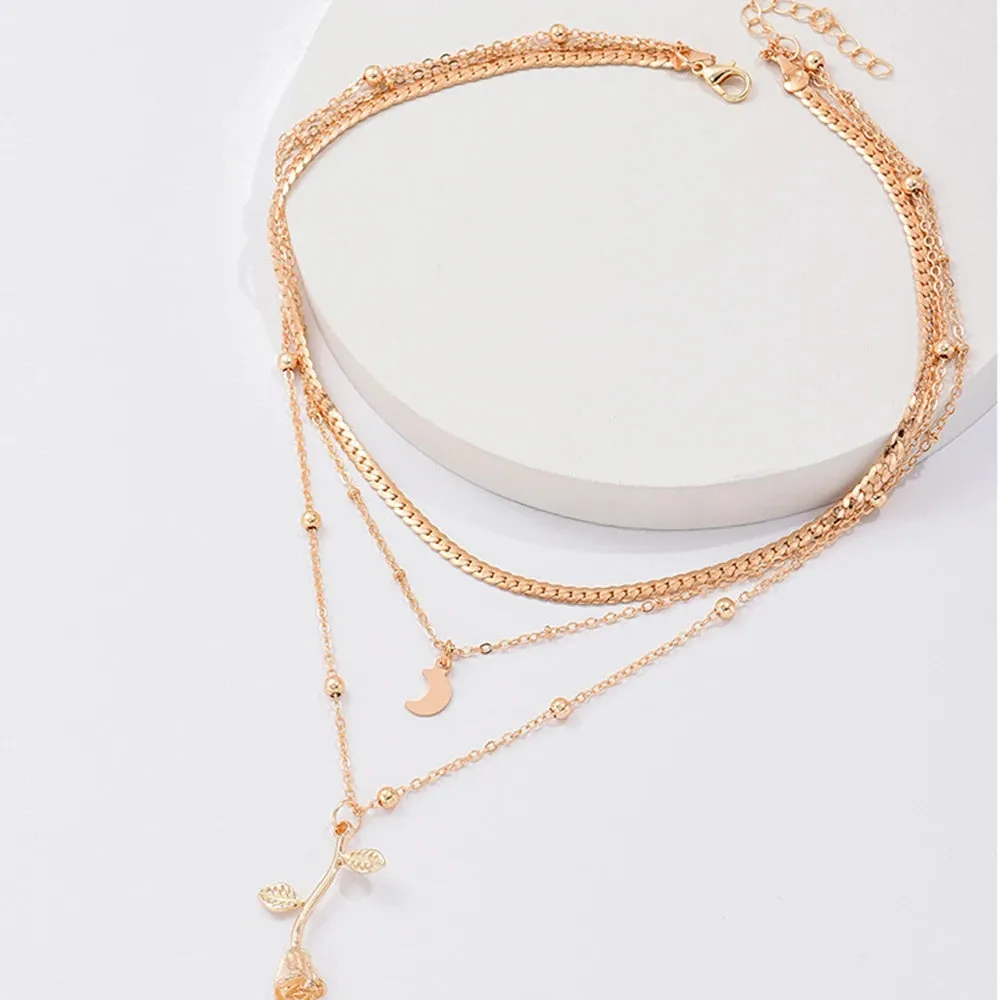 Bohemian gold rose flower multilayer pendant choker necklace on a woman, alloy snake bones chain