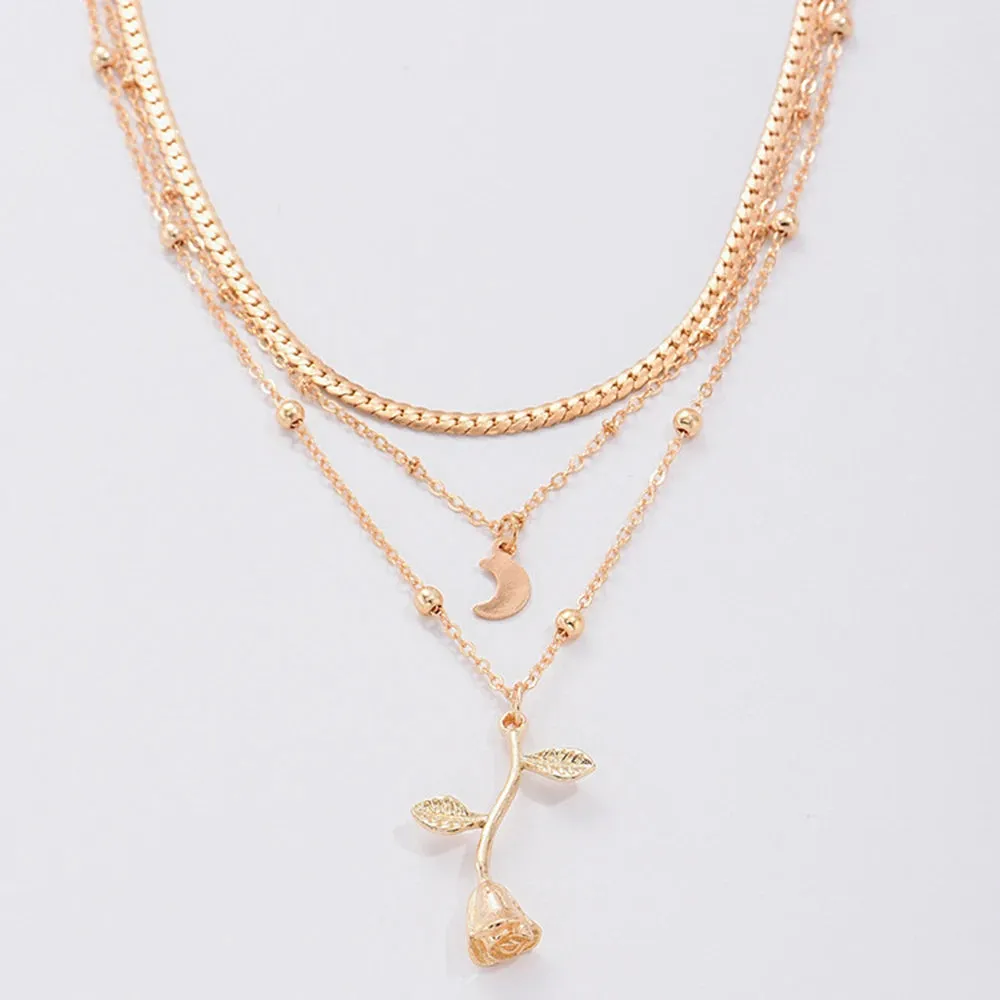 Bohemian gold rose flower multilayer pendant choker necklace on a woman, alloy snake bones chain