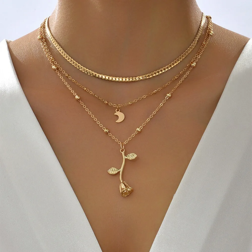 Bohemian gold rose flower multilayer pendant choker necklace on a woman, alloy snake bones chain