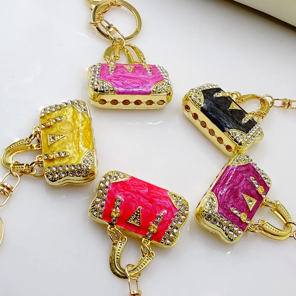 Alloy pendant keychain with enamel diamond cloud pattern in gold colour on keyring