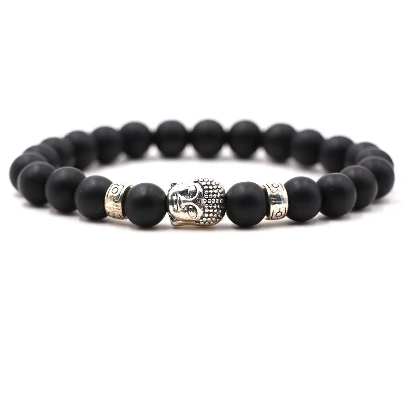 Natural stone stretch bracelet with round 8mm beads on a black background, showing Tigereye and turquoise colour options.