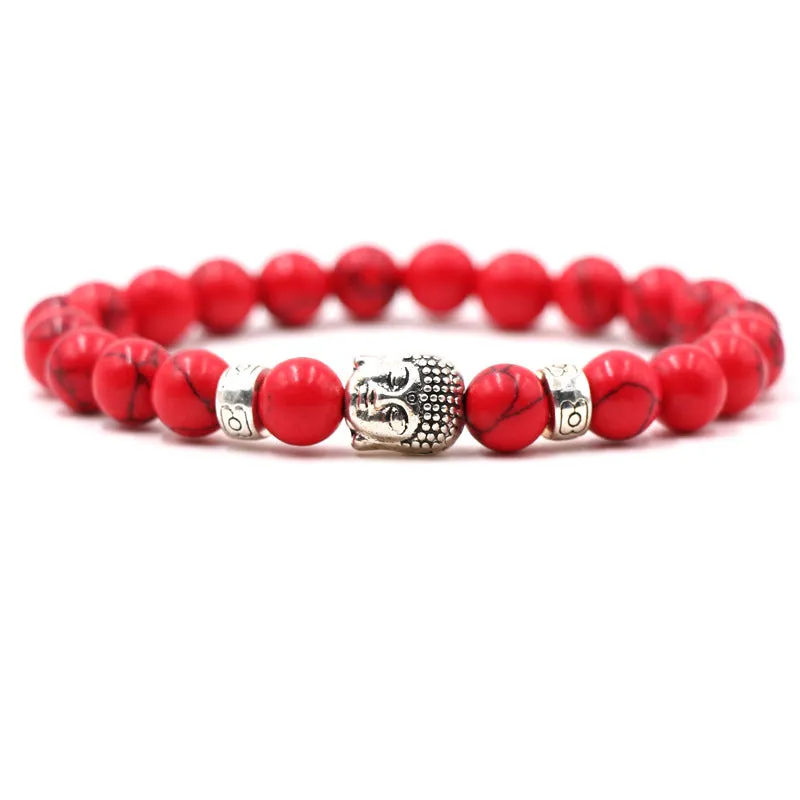 Natural stone stretch bracelet with round 8mm beads on a black background, showing Tigereye and turquoise colour options.