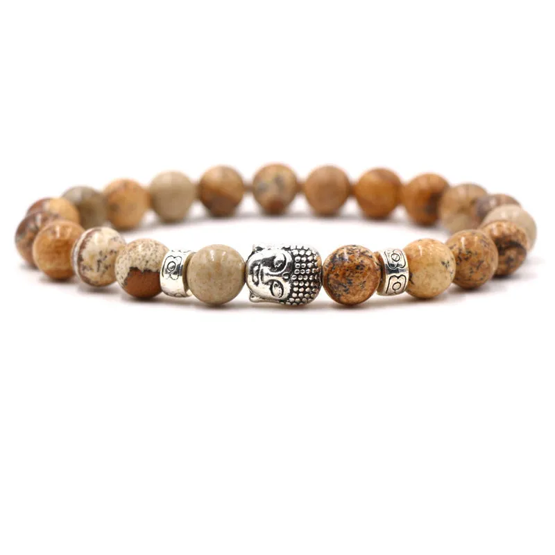 Natural stone stretch bracelet with round 8mm beads on a black background, showing Tigereye and turquoise colour options.