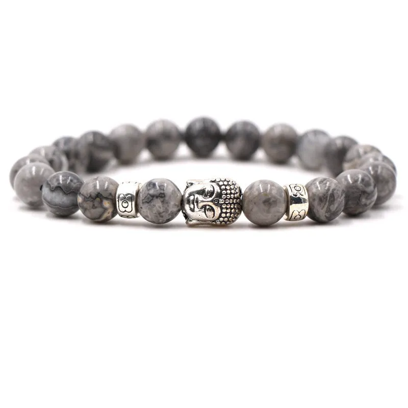 Natural stone stretch bracelet with round 8mm beads on a black background, showing Tigereye and turquoise colour options.