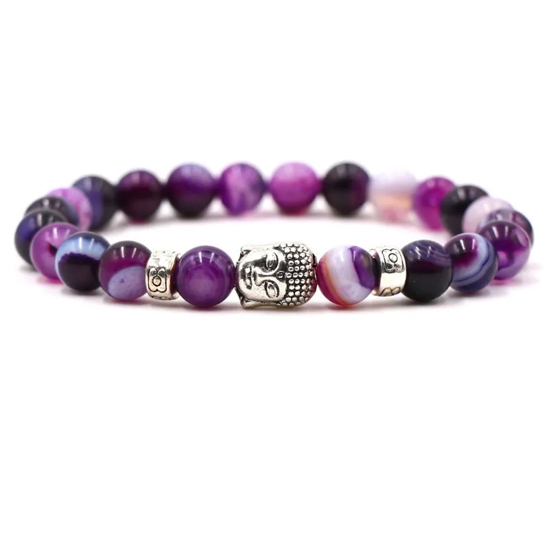 Natural stone stretch bracelet with round 8mm beads on a black background, showing Tigereye and turquoise colour options.