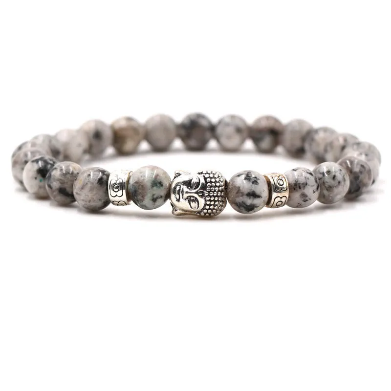 Natural stone stretch bracelet with round 8mm beads on a black background, showing Tigereye and turquoise colour options.