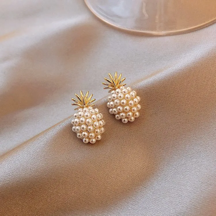 Korean style alloy earrings with pineapple and starfish motifs in gold colour, featuring inlaid artificial gems