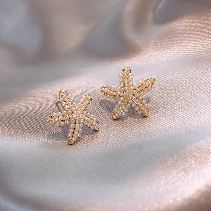 Korean style alloy earrings with pineapple and starfish motifs in gold colour, featuring inlaid artificial gems
