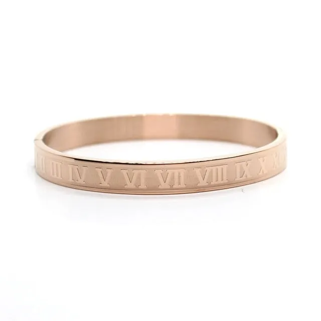 316L stainless steel bangle bracelet in silver finish with smooth surface on neutral background