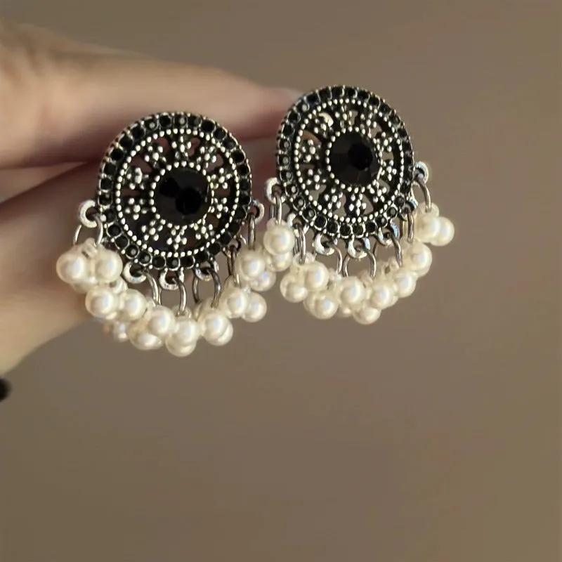 Pair of Miao maiden pearl earrings in round geometric shape with electroplating finish