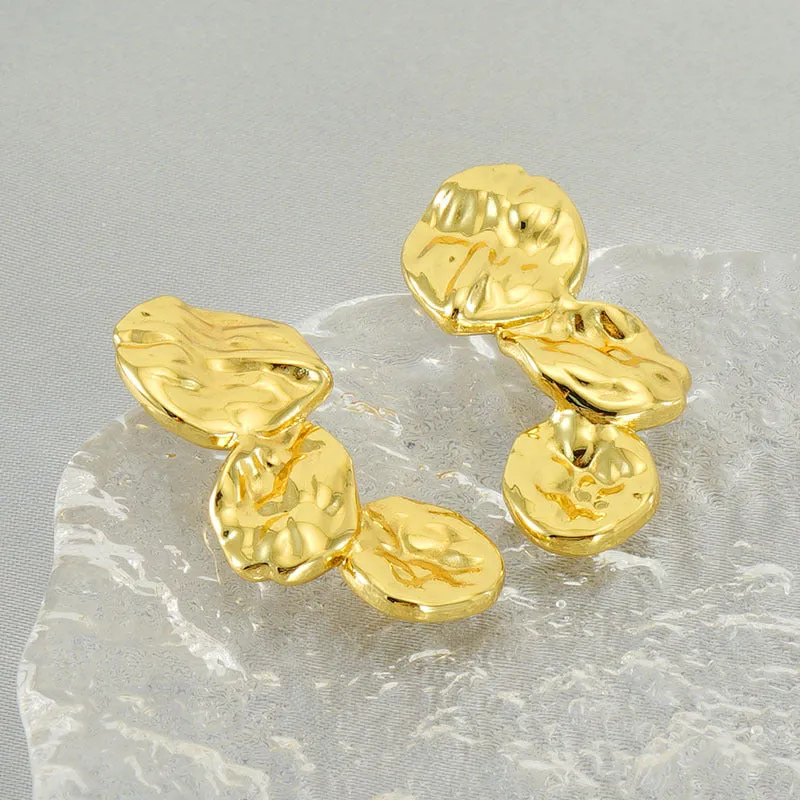 Gold stainless steel vintage petal earrings with irregular geometric shape and asymmetric folding design