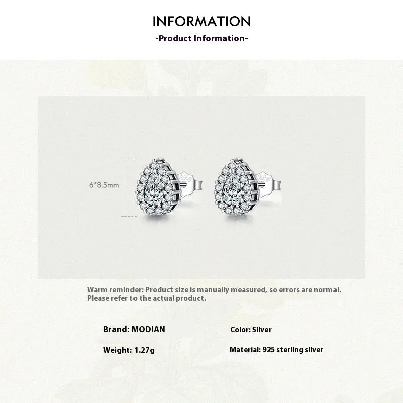 Women's silver water drop shaped ear studs made from 925 sterling silver with diamond treatment