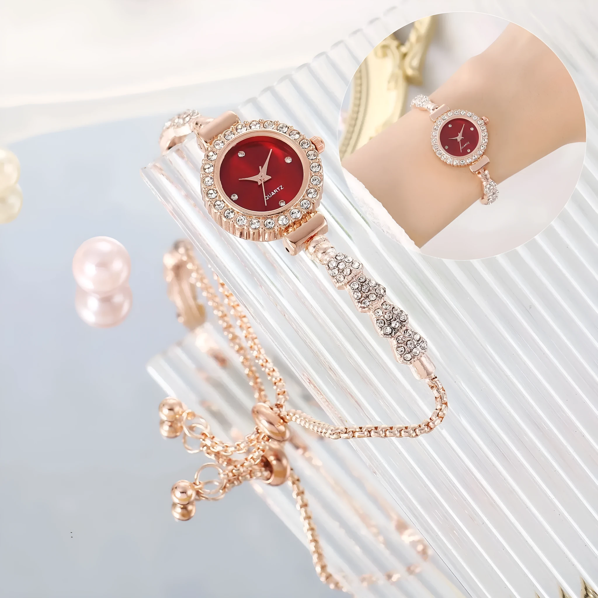 Gold fine strap women's watch with round dial and stainless steel jewellery buckle