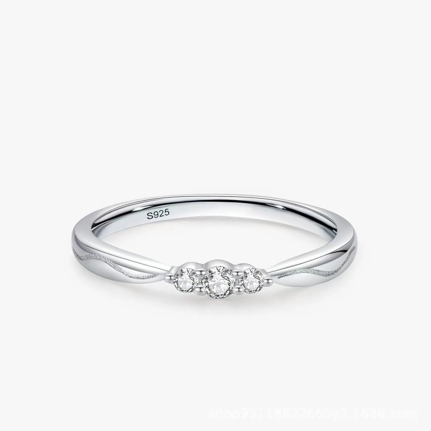 S925 sterling silver ripple wave ring with white gold electroplated finish on white background