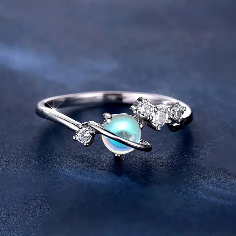Geometric copper ring with electroplated white gold finish, available in sizes No 6 to No 10, shown on a model's hand.