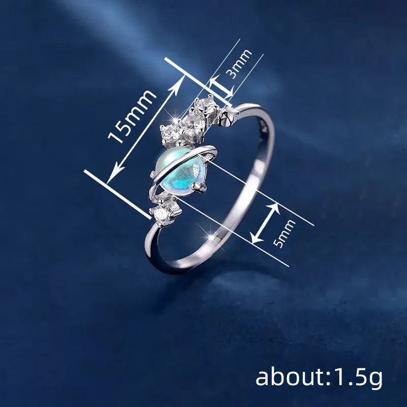 Geometric copper ring with electroplated white gold finish, available in sizes No 6 to No 10, shown on a model's hand.