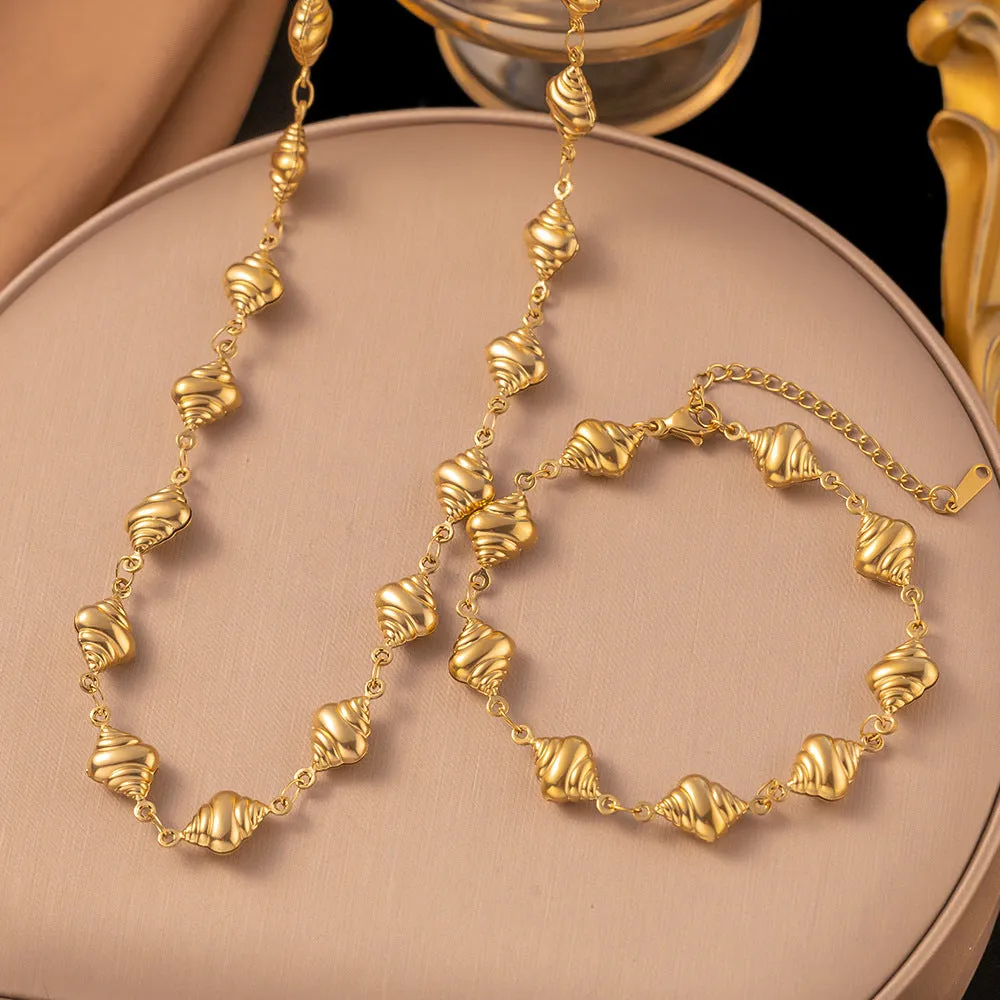 Gold conch necklace and bracelet set for women in titanium steel with pearl element
