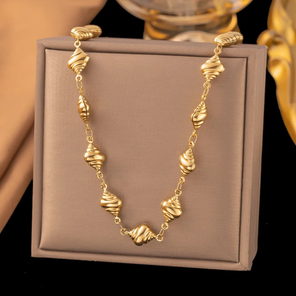 Gold conch necklace and bracelet set for women in titanium steel with pearl element