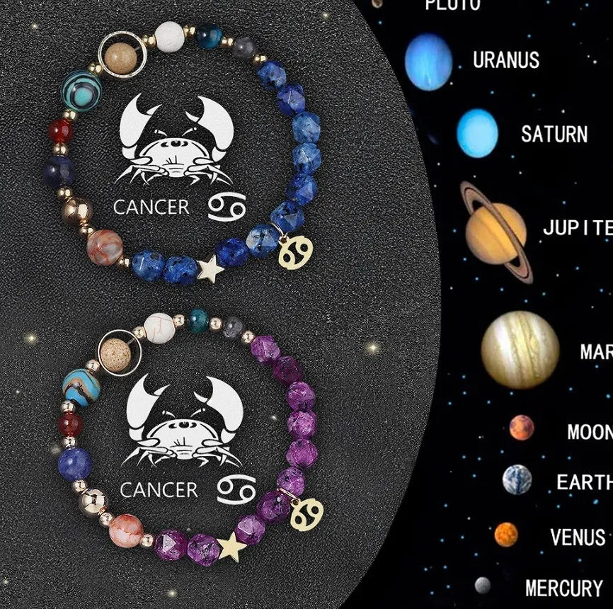 Set of two natural stone beaded bracelets with zodiac charms on a neutral background.