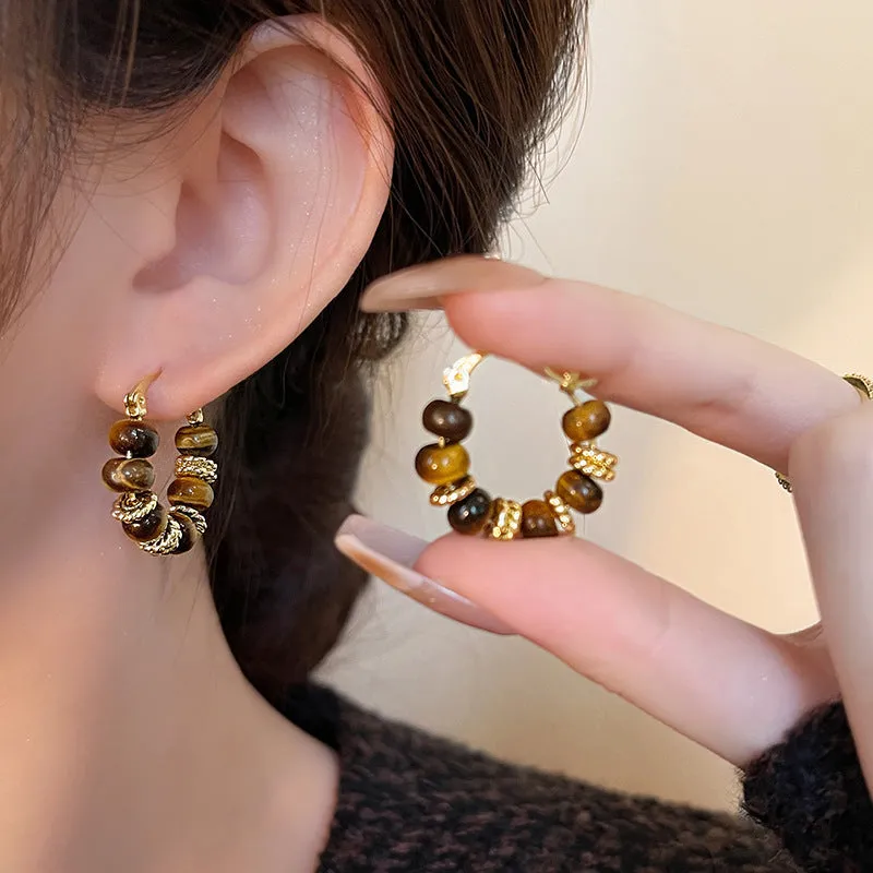 White retro Maillard tigereye women's trendy earrings with electroplated finish on plastic material