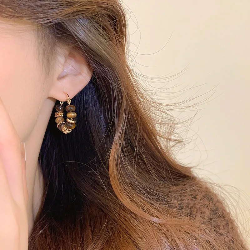 White retro Maillard tigereye women's trendy earrings with electroplated finish on plastic material