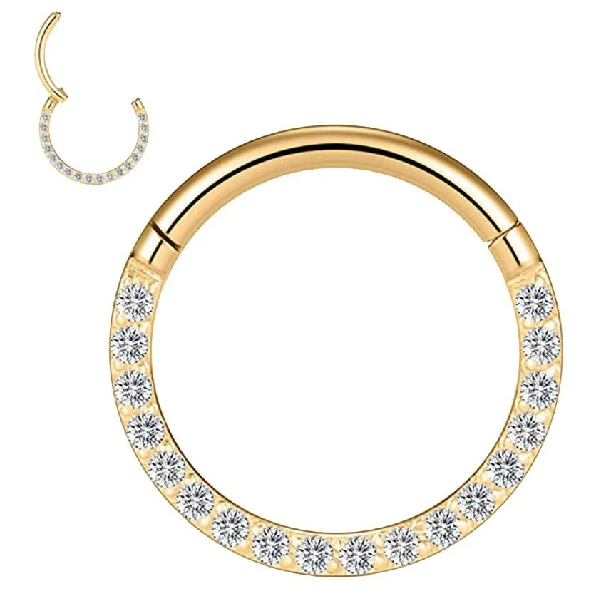 A round stainless steel seamless nose ring on a grey background, shown in a gold plated finish.