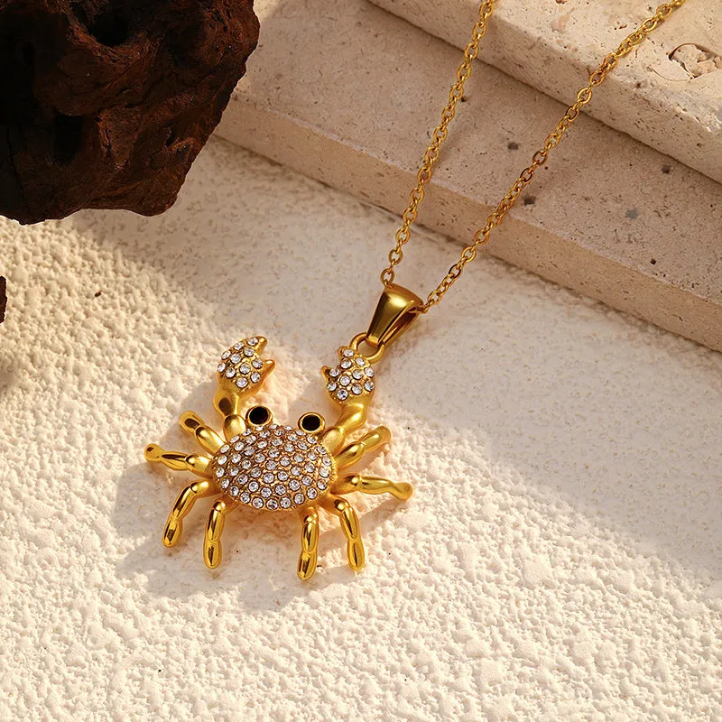 Gold electroplated stainless steel crab pendant necklace with diamond accents on regular chain, natural style