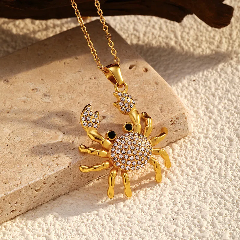 Gold electroplated stainless steel crab pendant necklace with diamond accents on regular chain, natural style