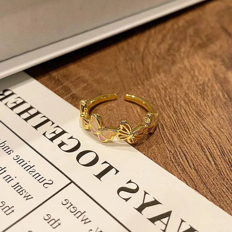 Copper women's butterfly ring charm with open loop, jewellery making component.