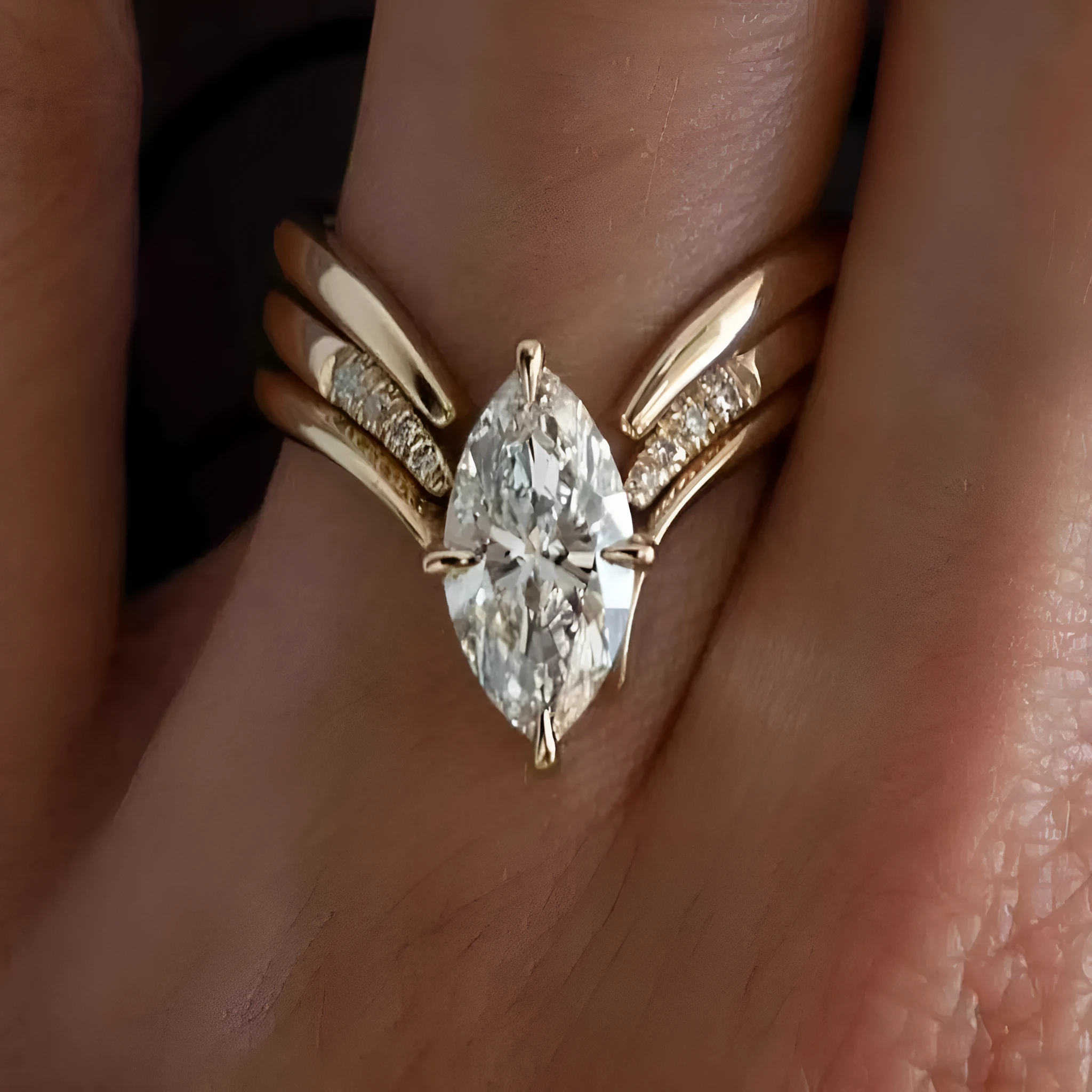 Gold zinc alloy three-piece geometric ring set with horse eye inlay on white background