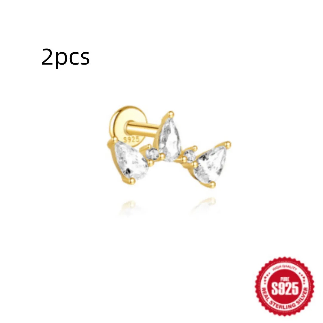 Close-up of a geometric water drop earring made from S925 sterling silver with a flat spiral puncture finding in a gold colour finish.