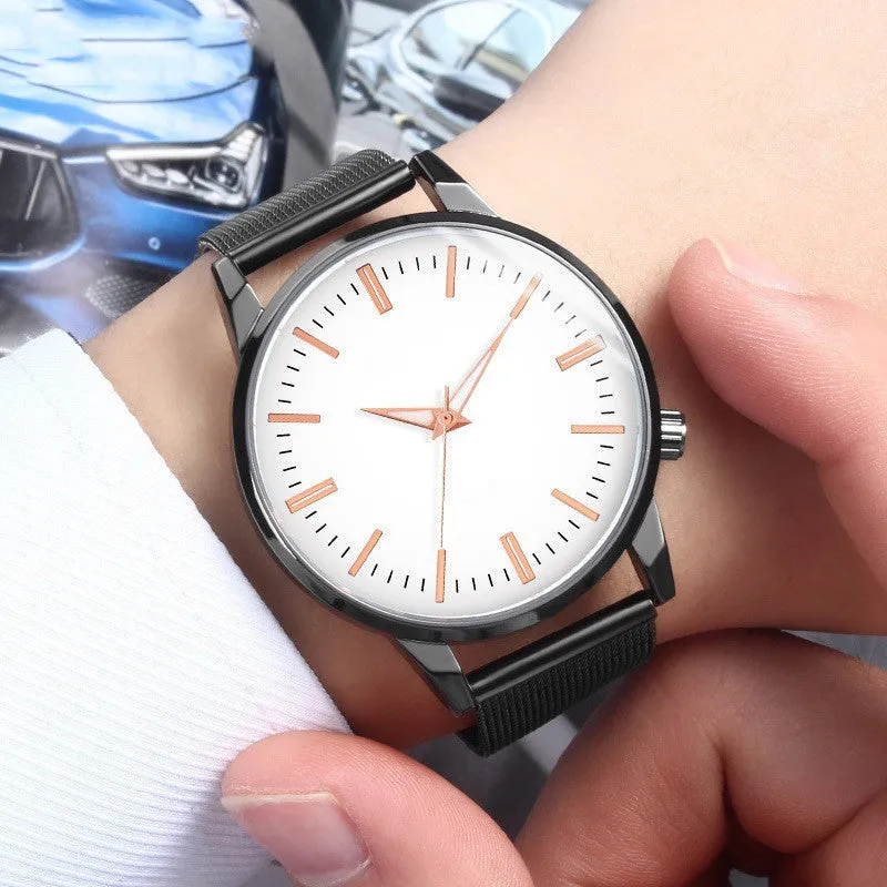 Men's and women's couple watch set with blue metal mesh band, luminous dial, and alloy case on a white background