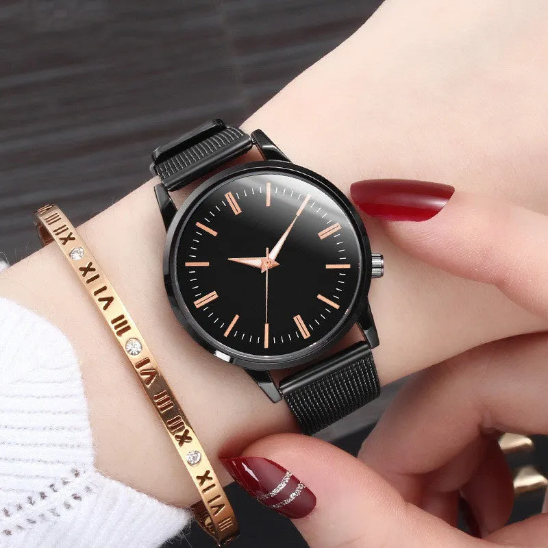 Men's and women's couple watch set with blue metal mesh band, luminous dial, and alloy case on a white background