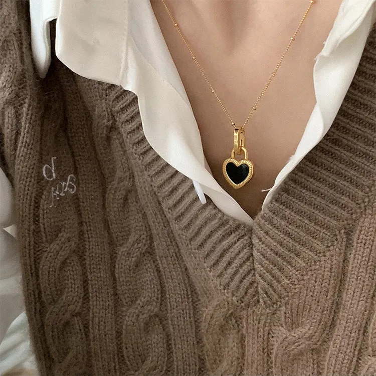 Double-sided shell love pendant necklace with mixed gem inlay on adjustable chain, available in gold-plated copper or titanium steel