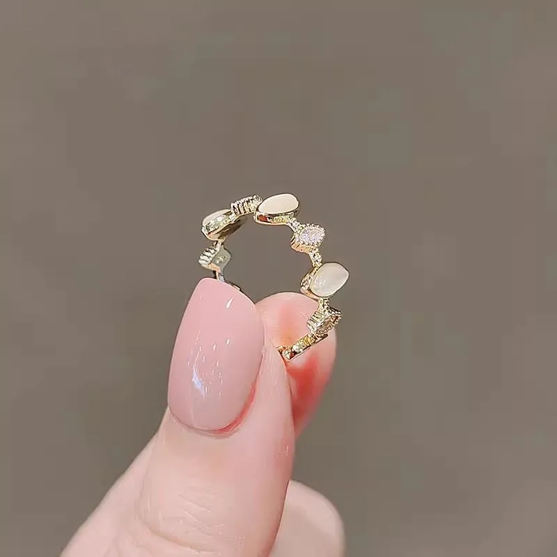 Copper geometric water drop ring for women with electroplated finish on white background