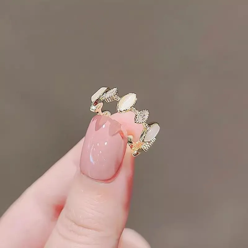 Copper geometric water drop ring for women with electroplated finish on white background